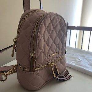 Micheal Kors mini book bag purse